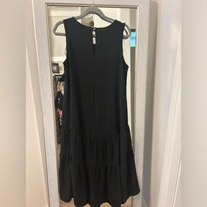 Black dress worn twice , ruffles on bottom